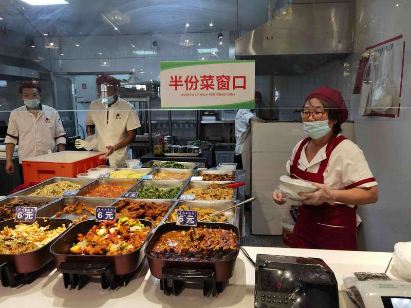 江苏大学"半份菜"助力"光盘行动"