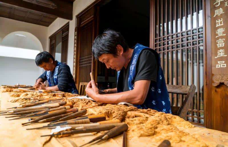 錢袋子劍川木雕產品遠銷120多個國家和地區