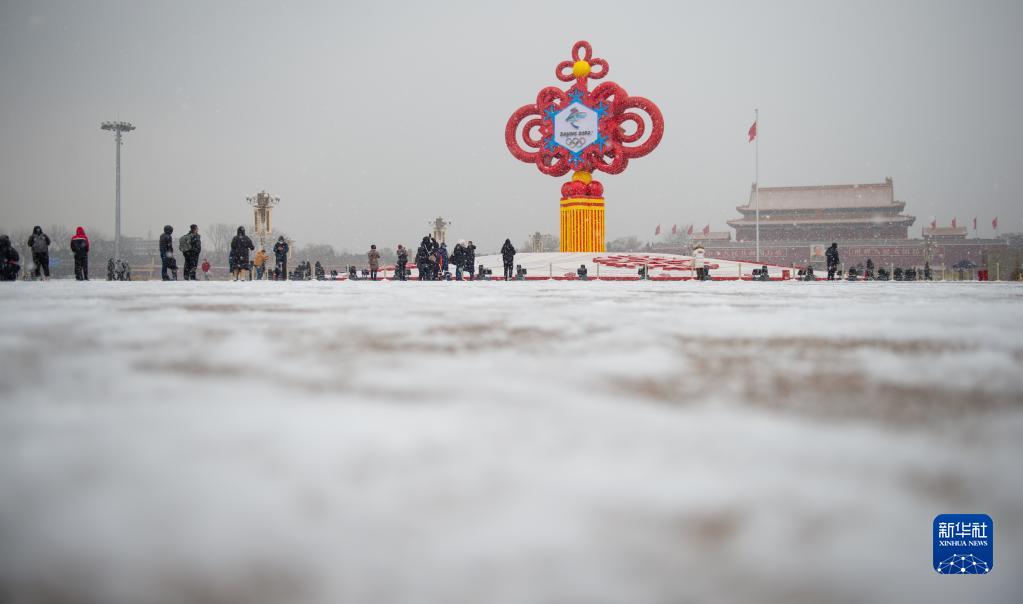 北京雪花飘起来照片图片
