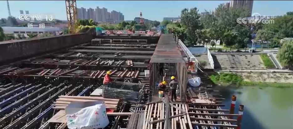 Construction workers wear advanced cooling suits.